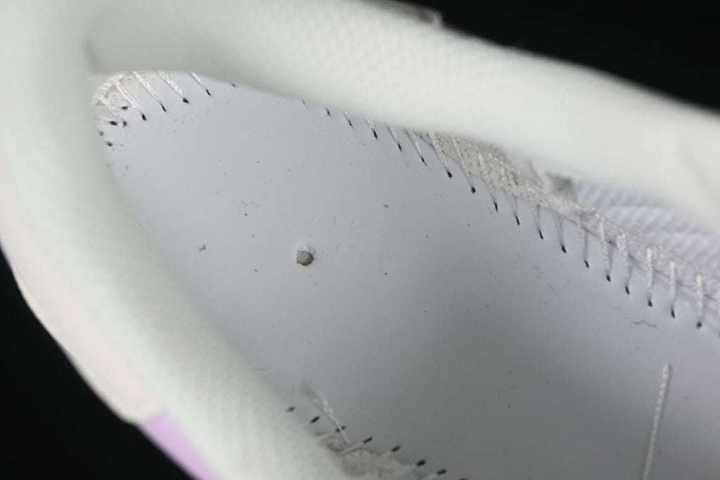 Close-up detail of the sneaker's interior stitching