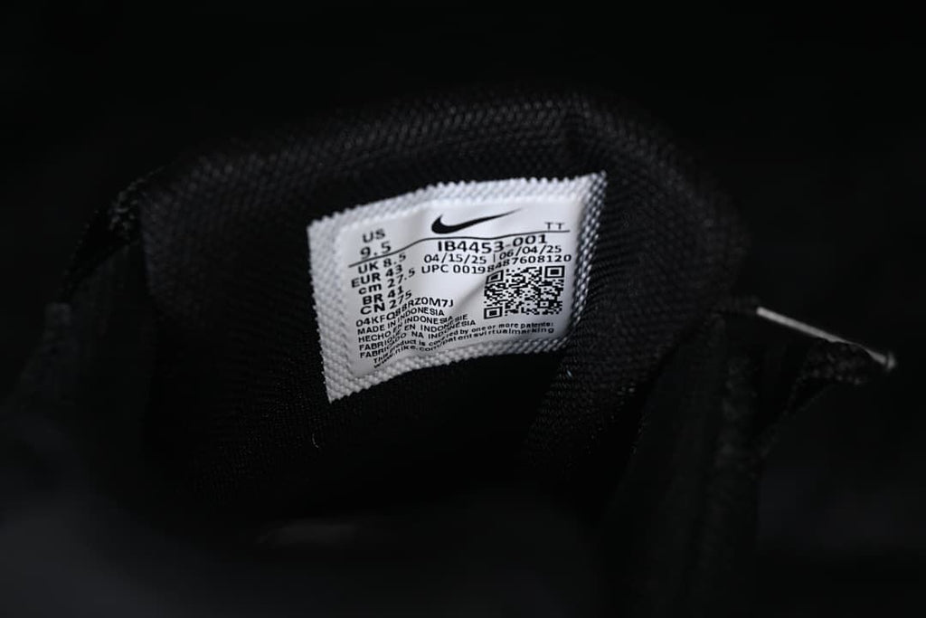 Close-up of the shoe tongue label showing model code IB4453-001 and a sample size