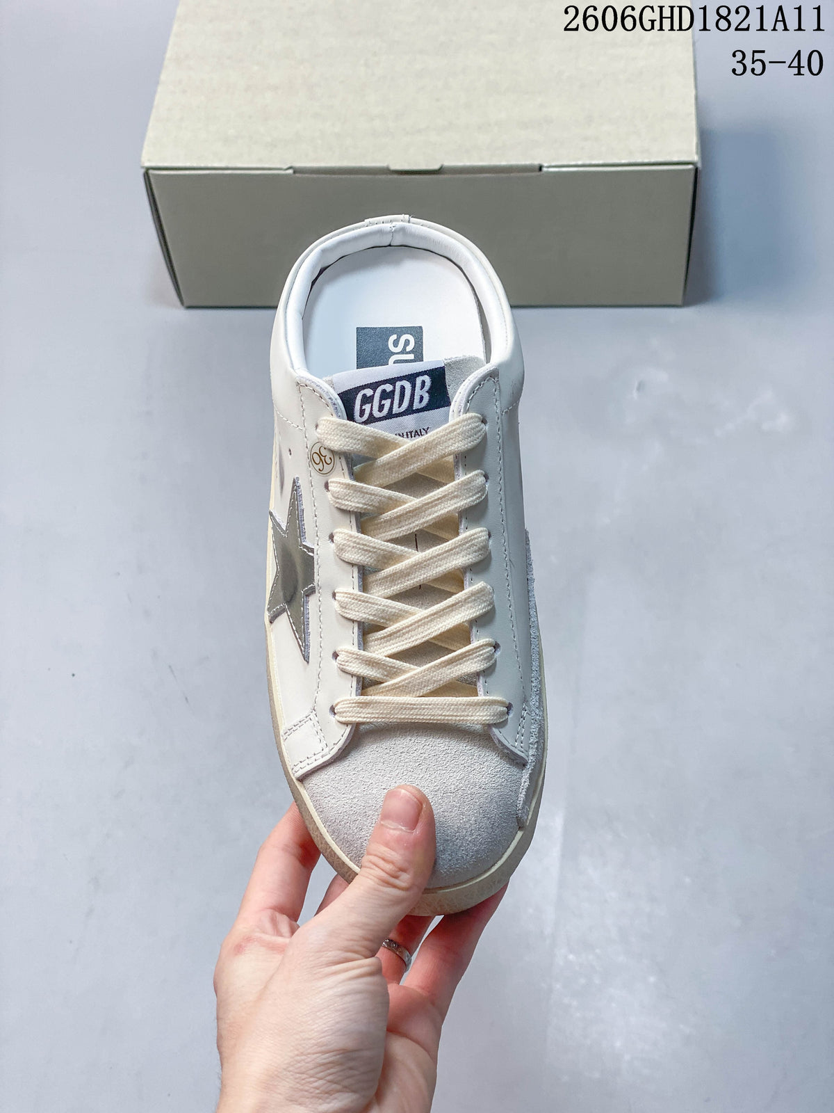 Top view of the sneaker with cream laces and a light gray toe panel
