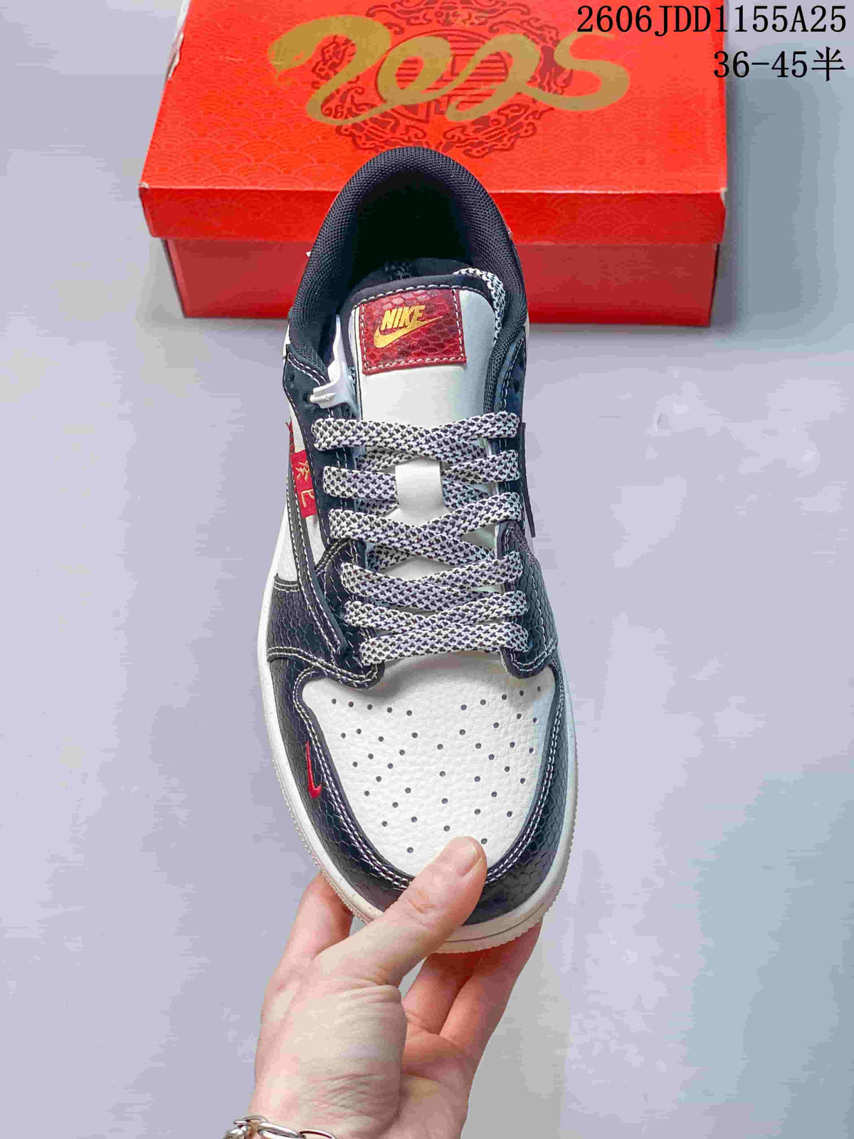 Top view showing perforated toe, patterned laces, and red tongue label