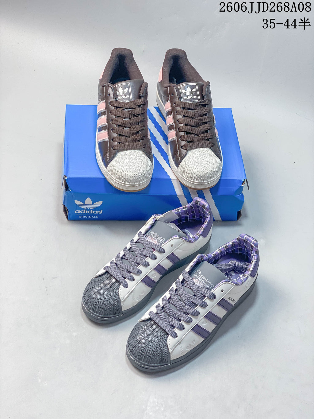 Two pictured Superstar 2 colorways: brown and pink, and white and purple.