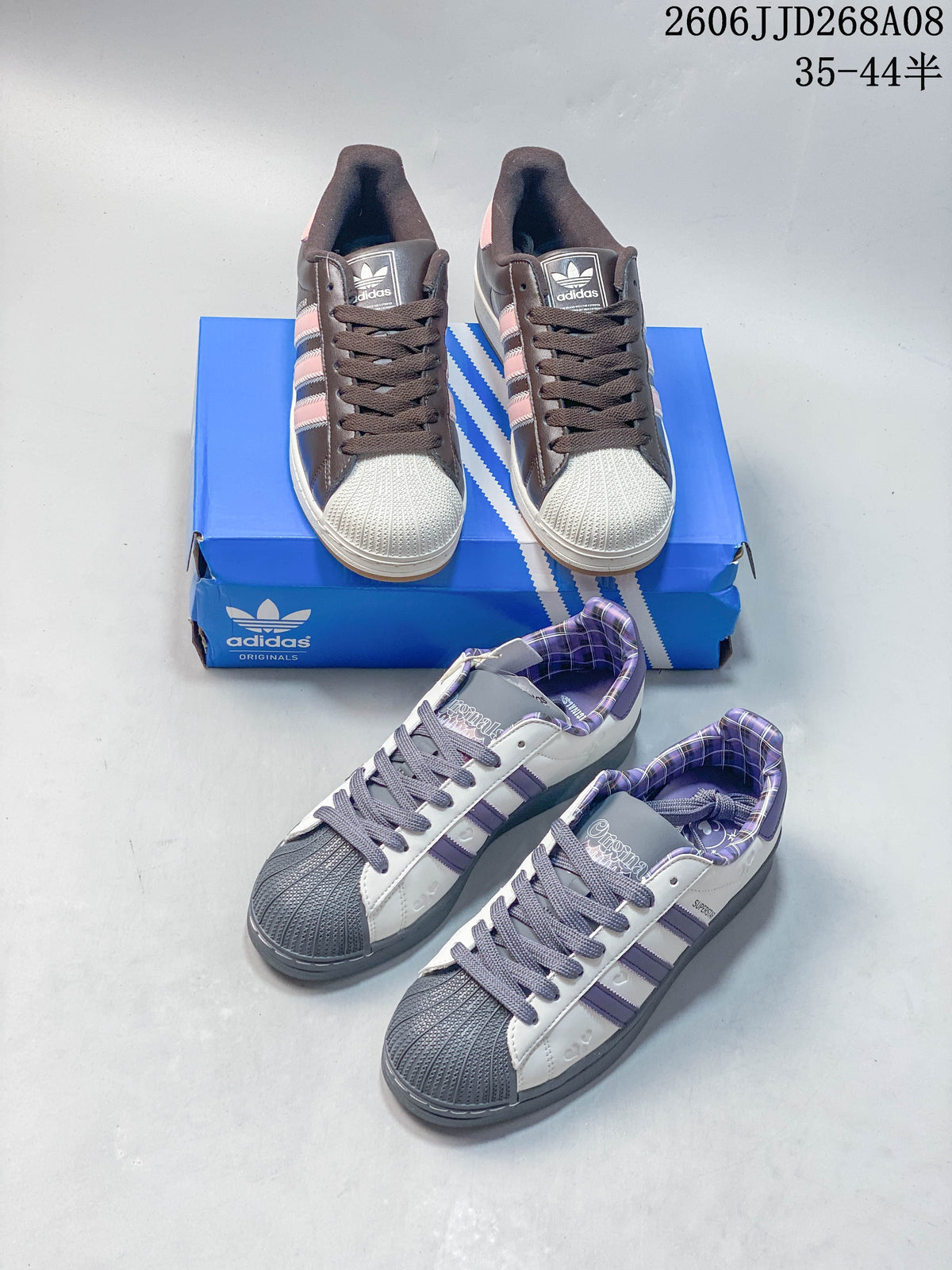 Two pictured Superstar 2 colorways: brown and pink, and white and purple.