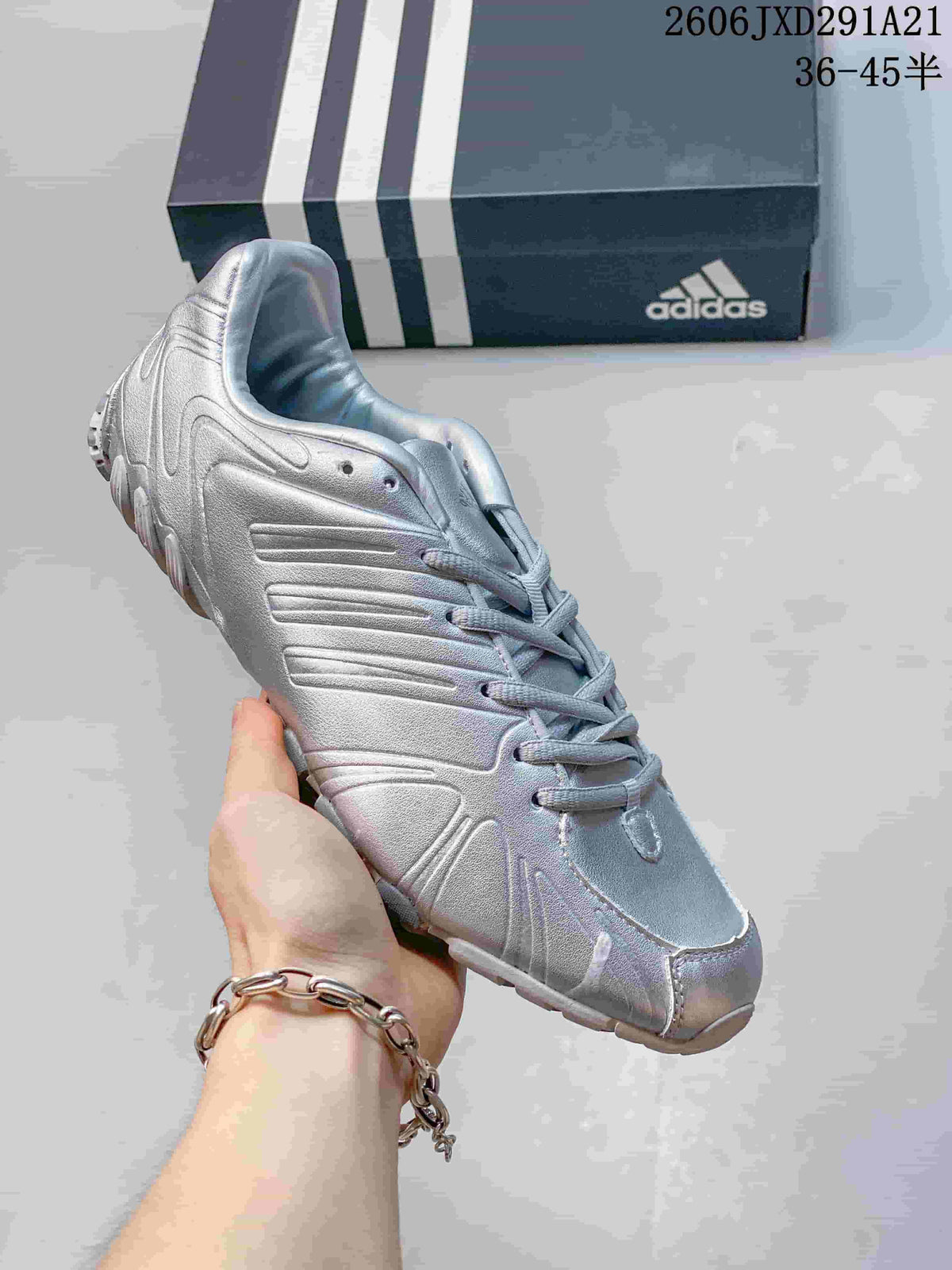 Light-colored adidas Ghost Sprint sneaker shown from the side and front.