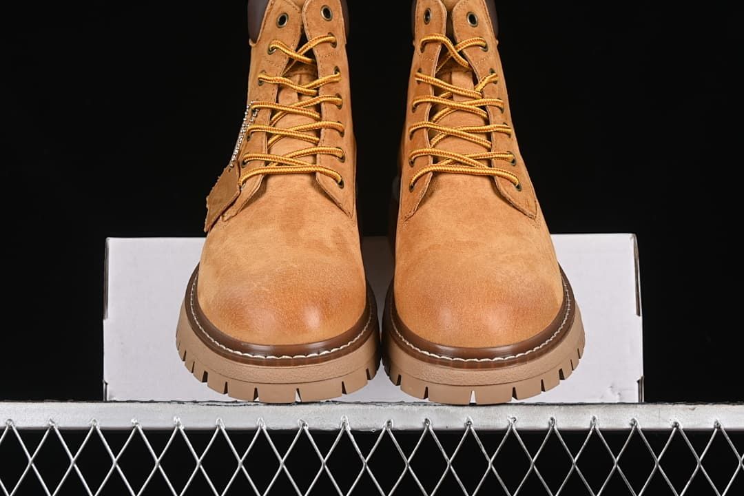 Front view of the pair of lace-up boots