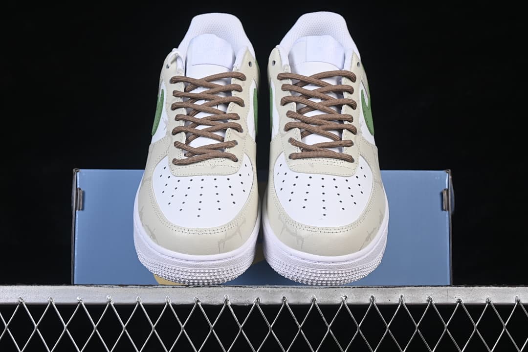 Front view of both shoes showing perforated toes and brown laces