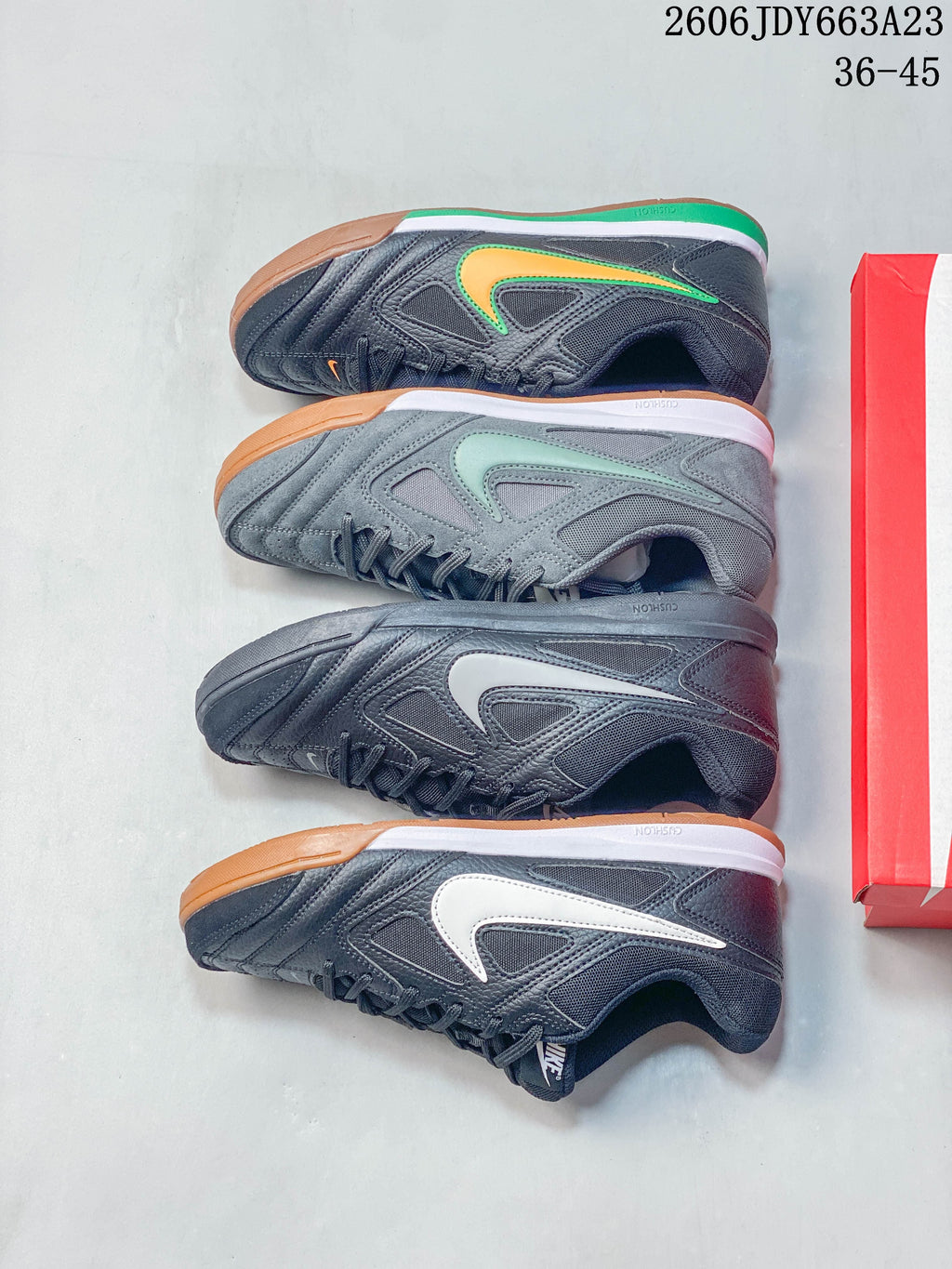 Four Nike Gato sneakers arranged side by side, showing navy, gray, and white-accented color variations