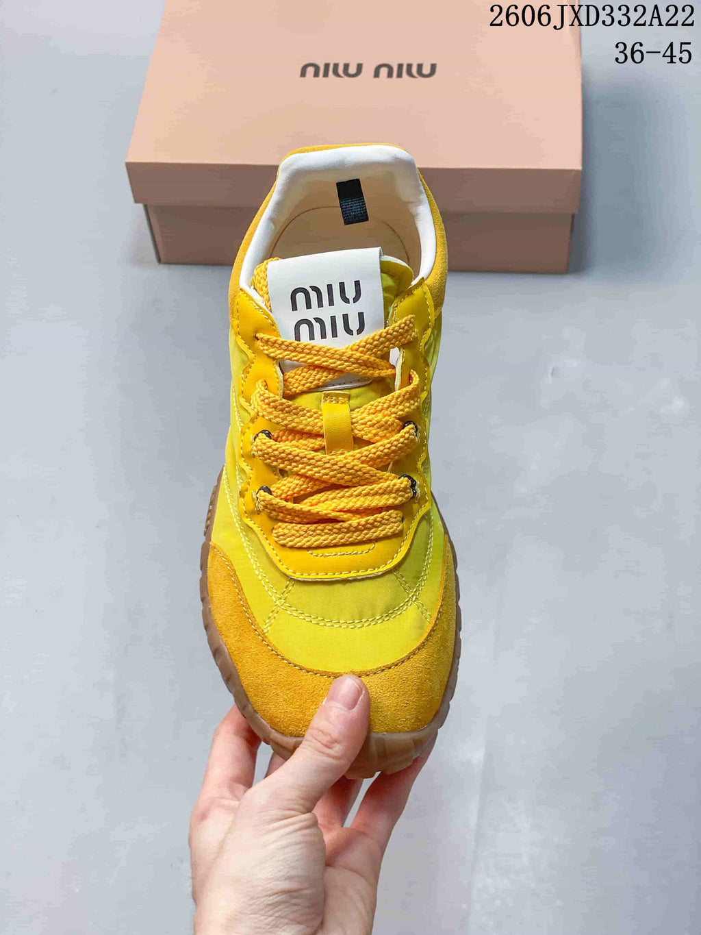 Top view showing the laces, rounded toe, and tongue logo