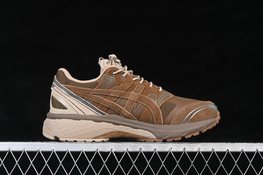 Opposite side profile of the brown and beige sneaker.