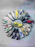 A group of Onitsuka Tiger EDR 78 sneakers in assorted color combinations; image also displays a size range.