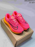 Pair of pink and orange Nike Zoom Fly 5 running shoes on a box
