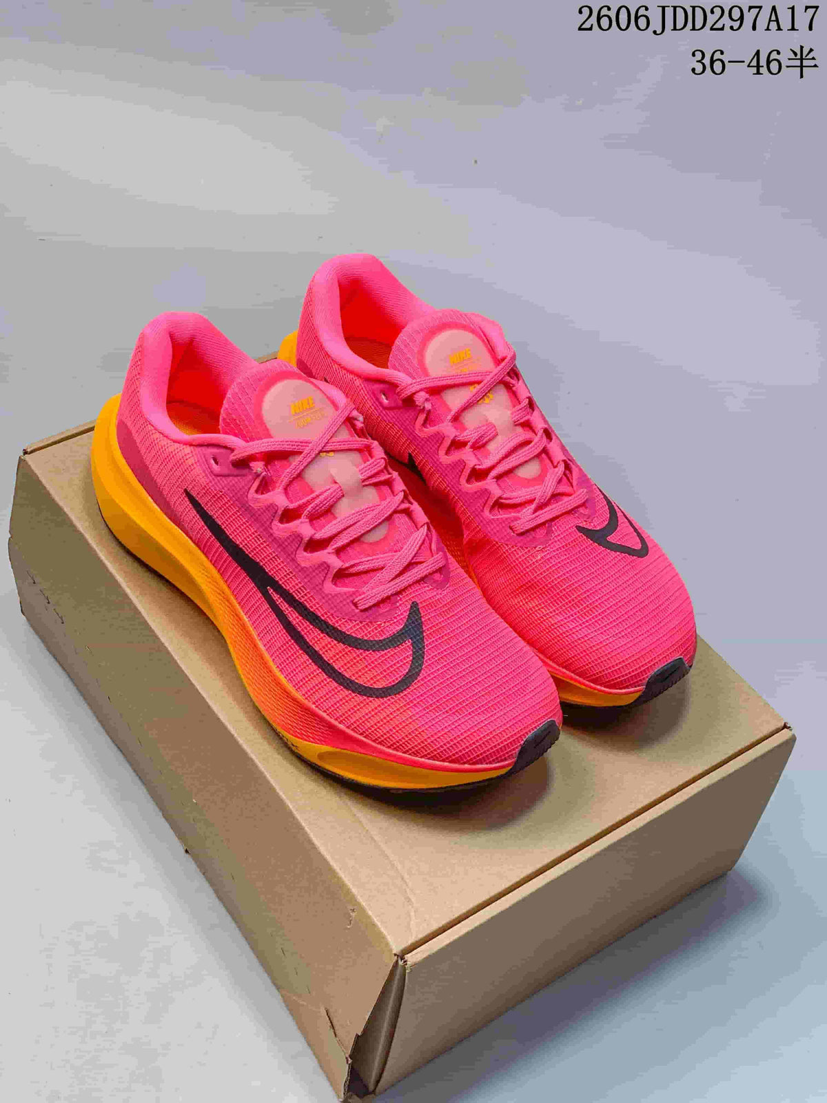 Pair of pink and orange Nike Zoom Fly 5 running shoes on a box