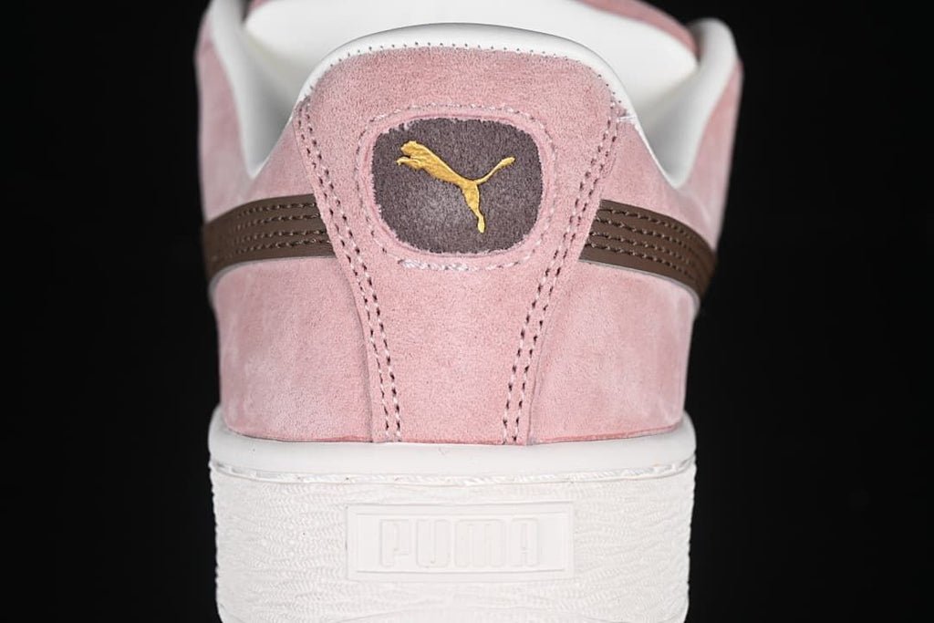 Rear view highlighting the heel branding and white sole.