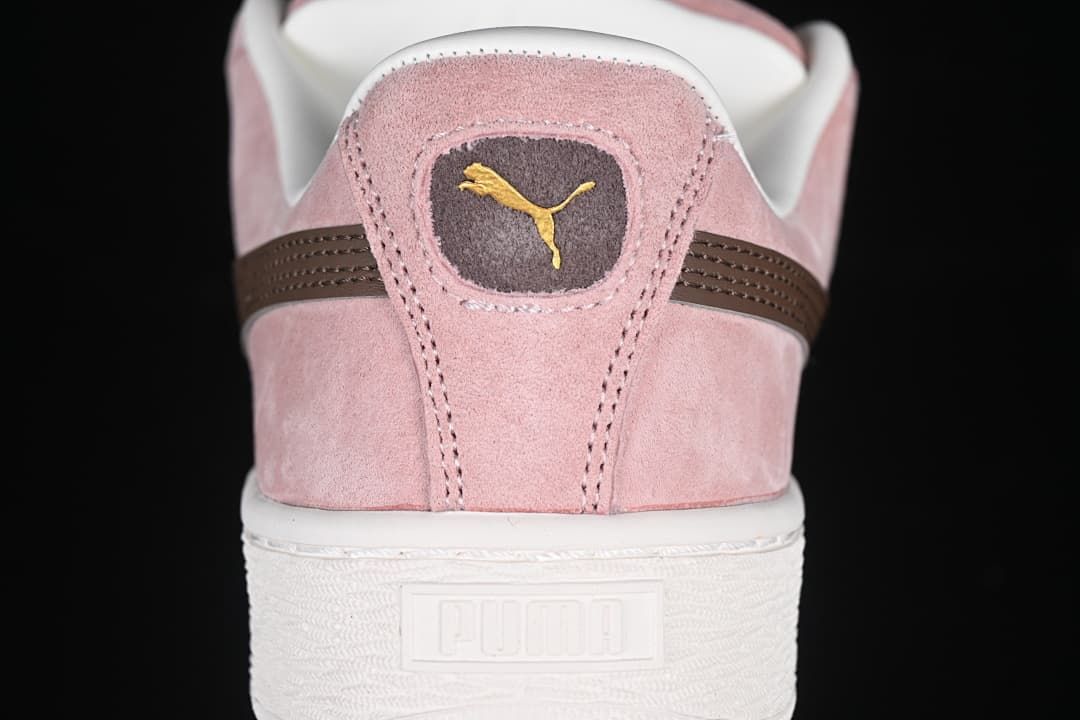 Rear view highlighting the heel branding and white sole.