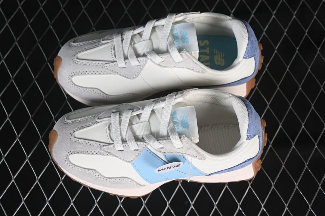Top-down view of the pair showing the white, blue, and grey color combination.