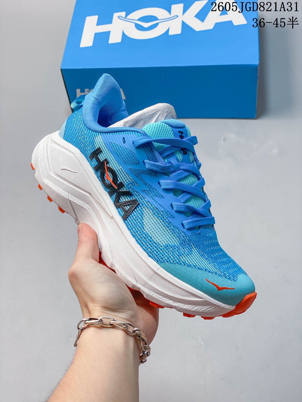 Blue HOKA Challenger 8 mesh running shoe with a white midsole and orange outsole accents