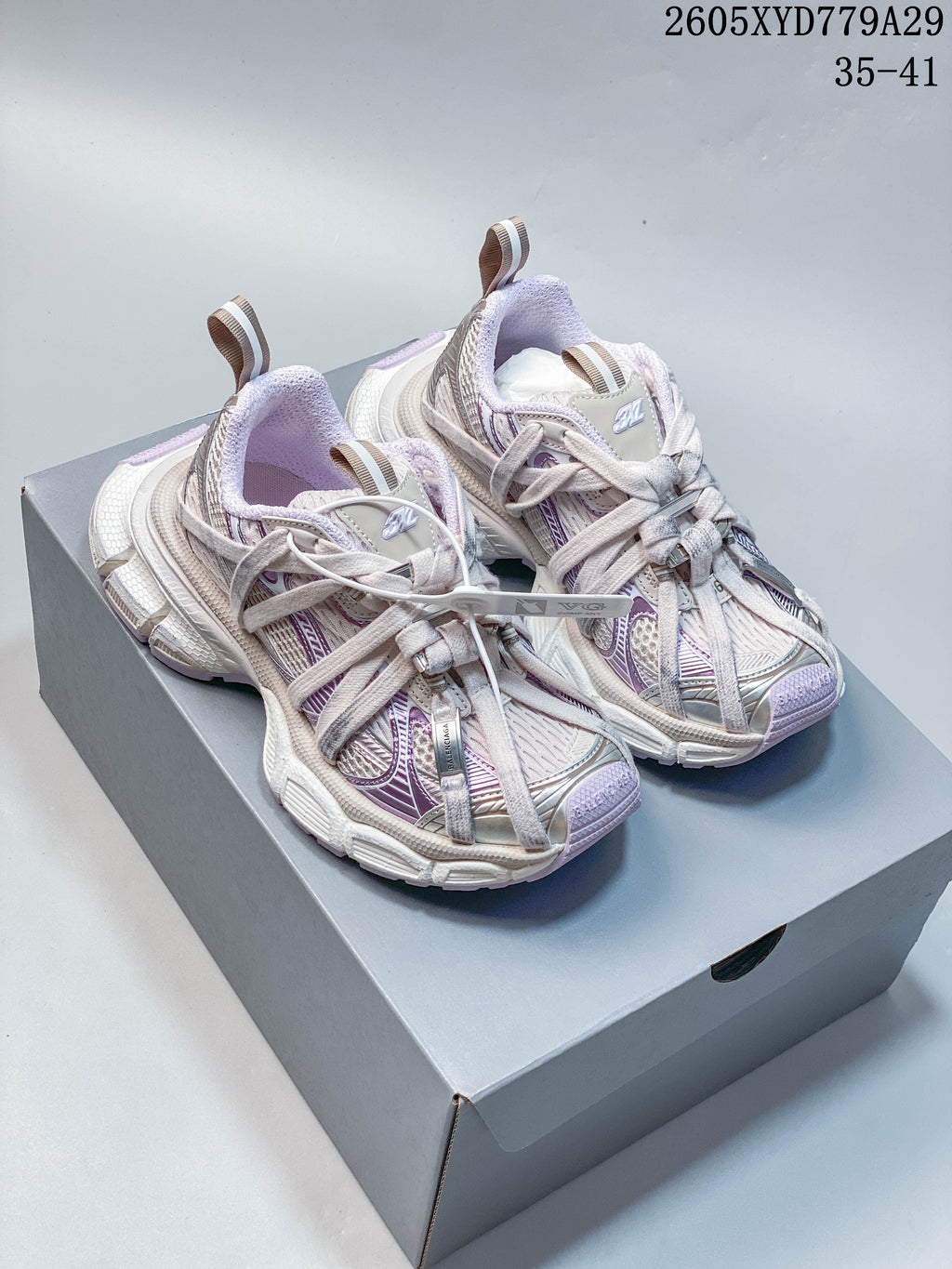 Pale lilac and silver Balenciaga Phantom sneakers shown from above on a box.