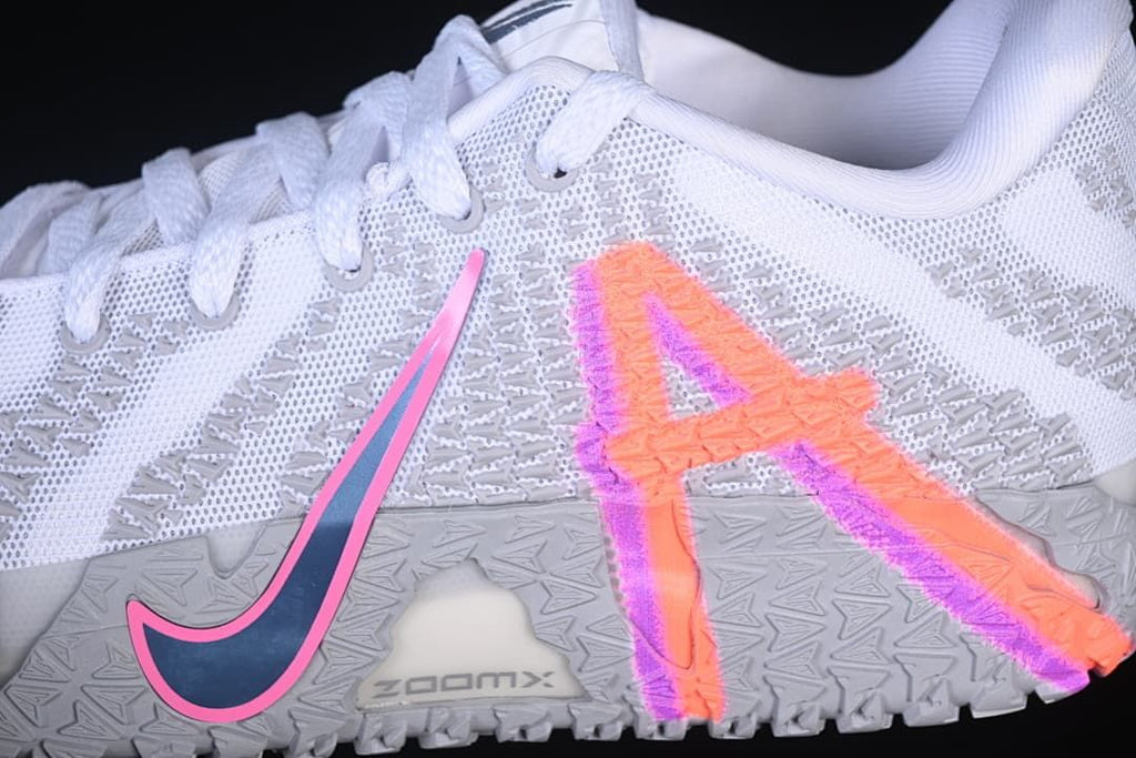 Close-up of the side Swoosh and colorful heel graphic