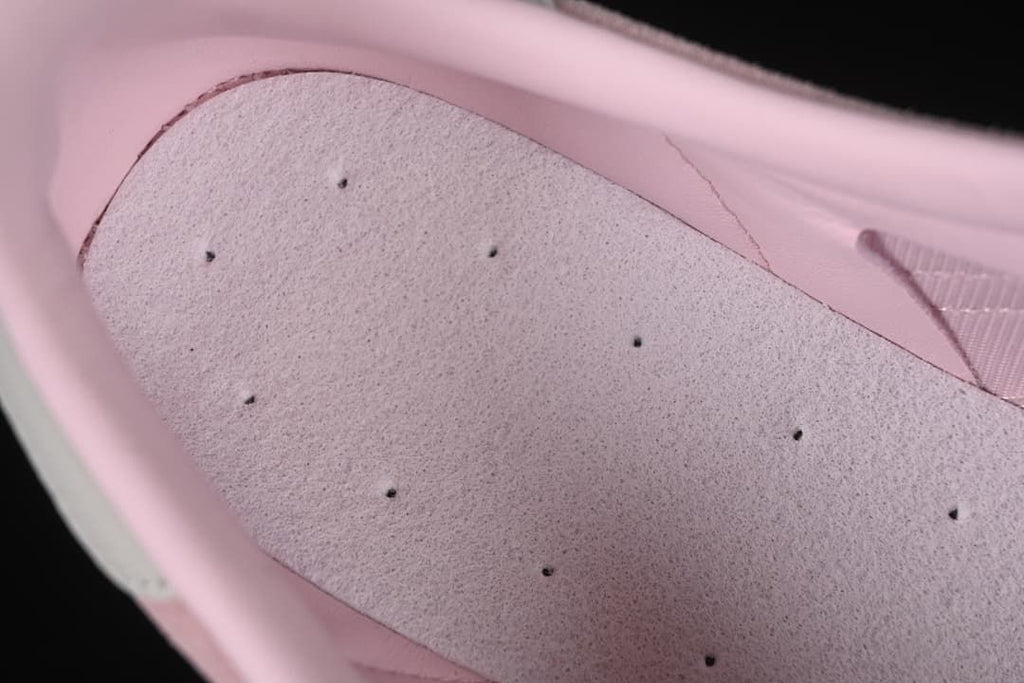 Close-up view inside the pink sneaker