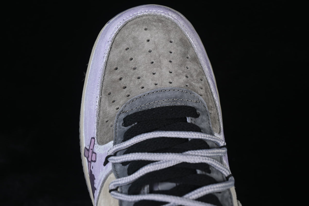 Top-down view of perforated toe panel and laces