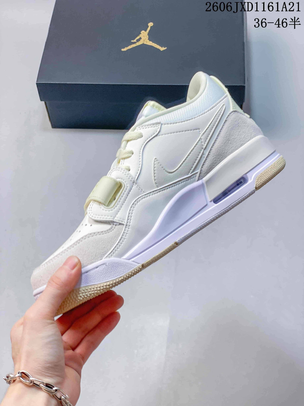 Side view of the Jordan Legacy 312 Low with suede-look heel and toe overlays
