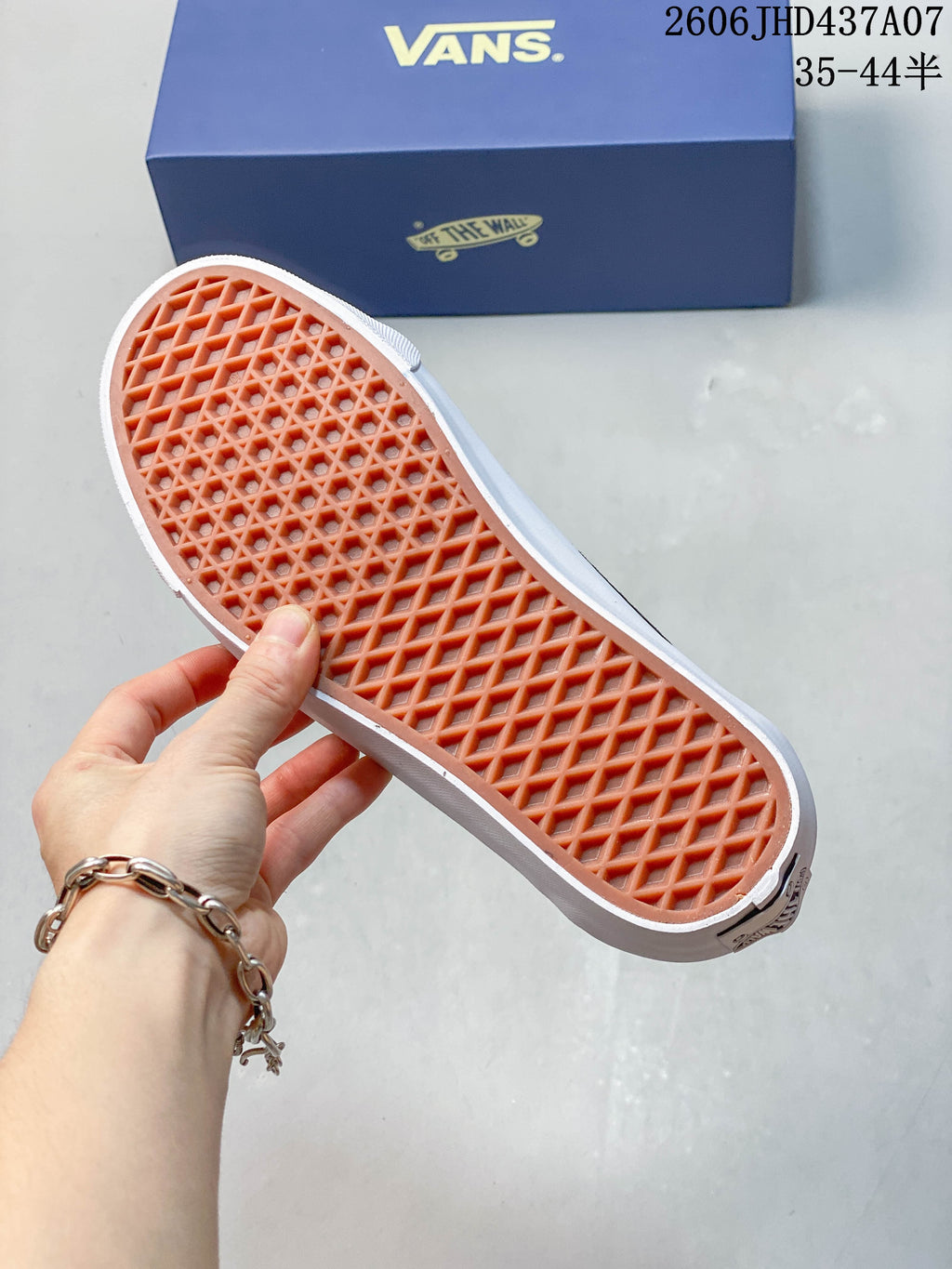 Close-up of the waffle-pattern outsole on a Vans sneaker