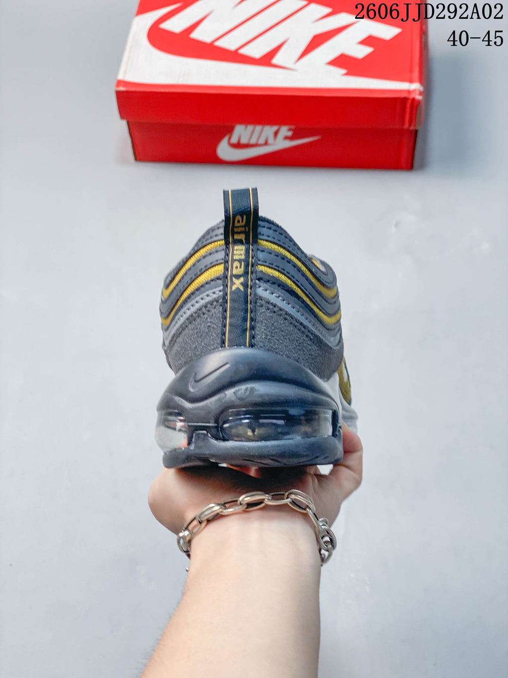 Rear view of the Nike Air Max 97 showing the heel and visible Air unit