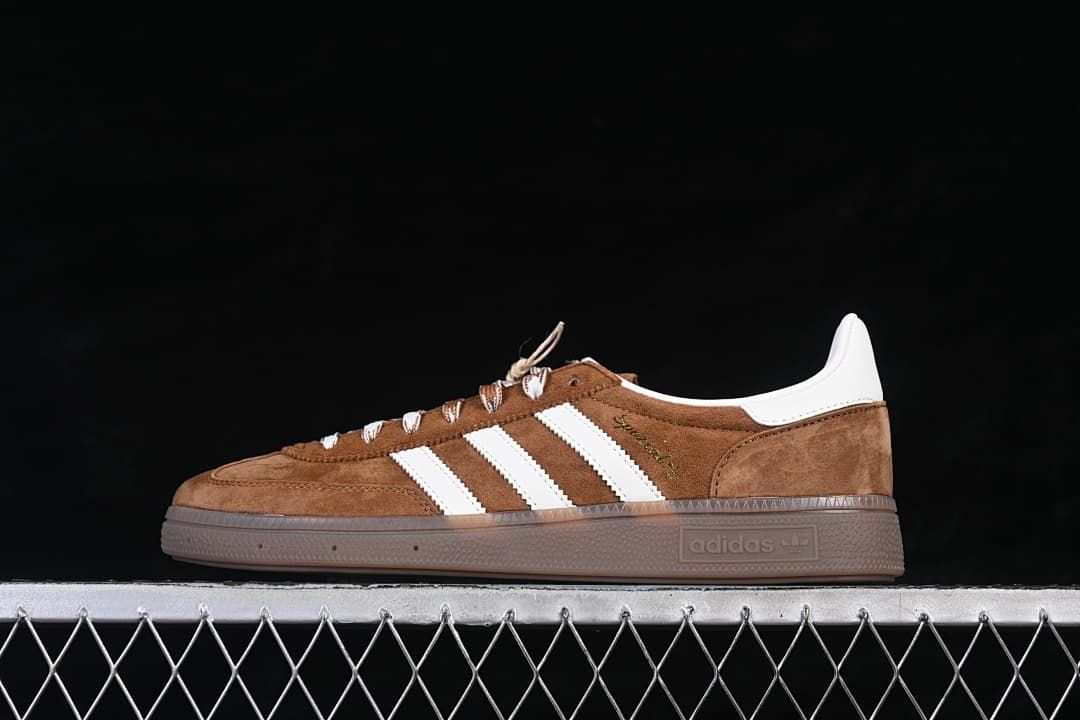 Side profile of brown and white adidas Handball Spezial sneakers with a gum-tone sole