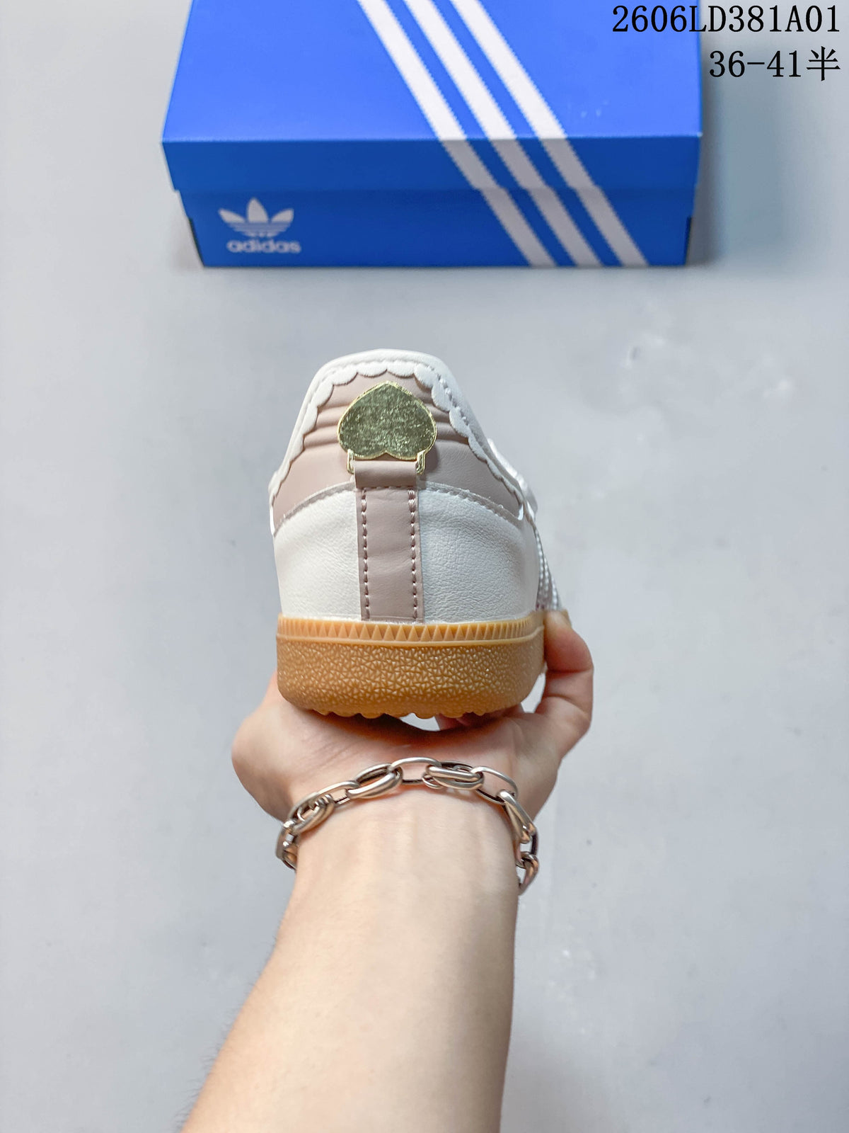Rear view of the Adidas Samba Jane sneaker showing its heel panels and gum-colored sole.
