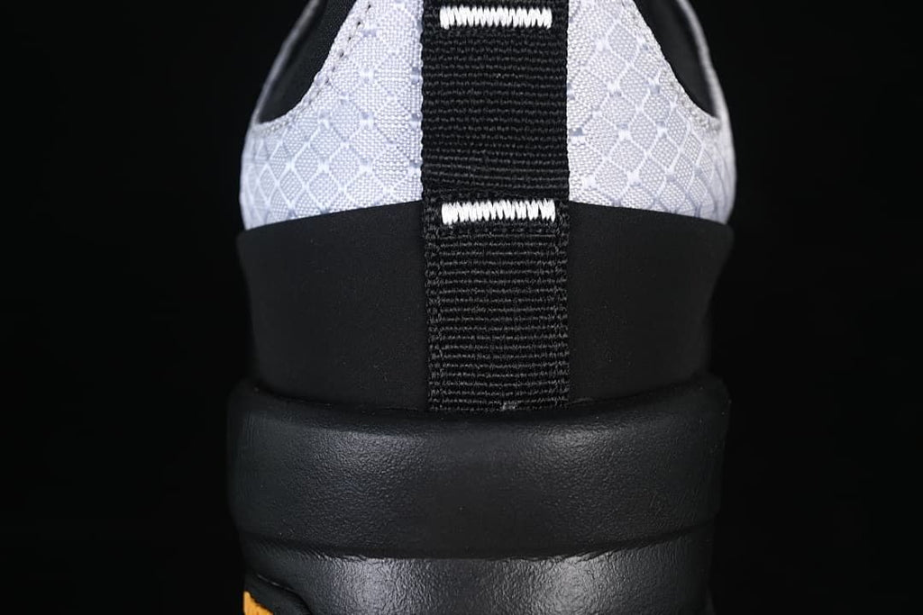 Rear view showing the patterned upper and heel pull tab.