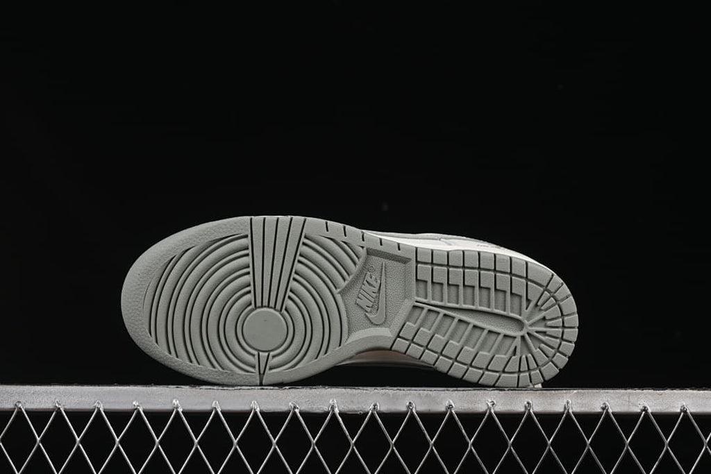 Underside view showing the grey patterned outsole