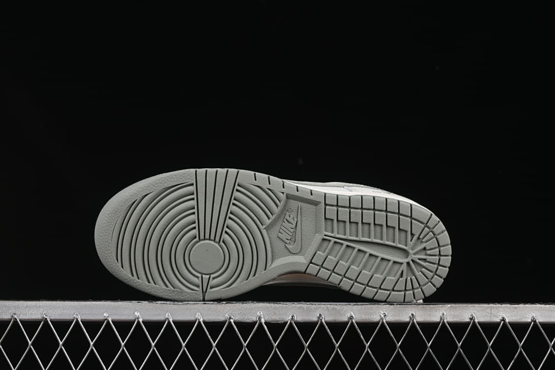 Underside view showing the grey patterned outsole