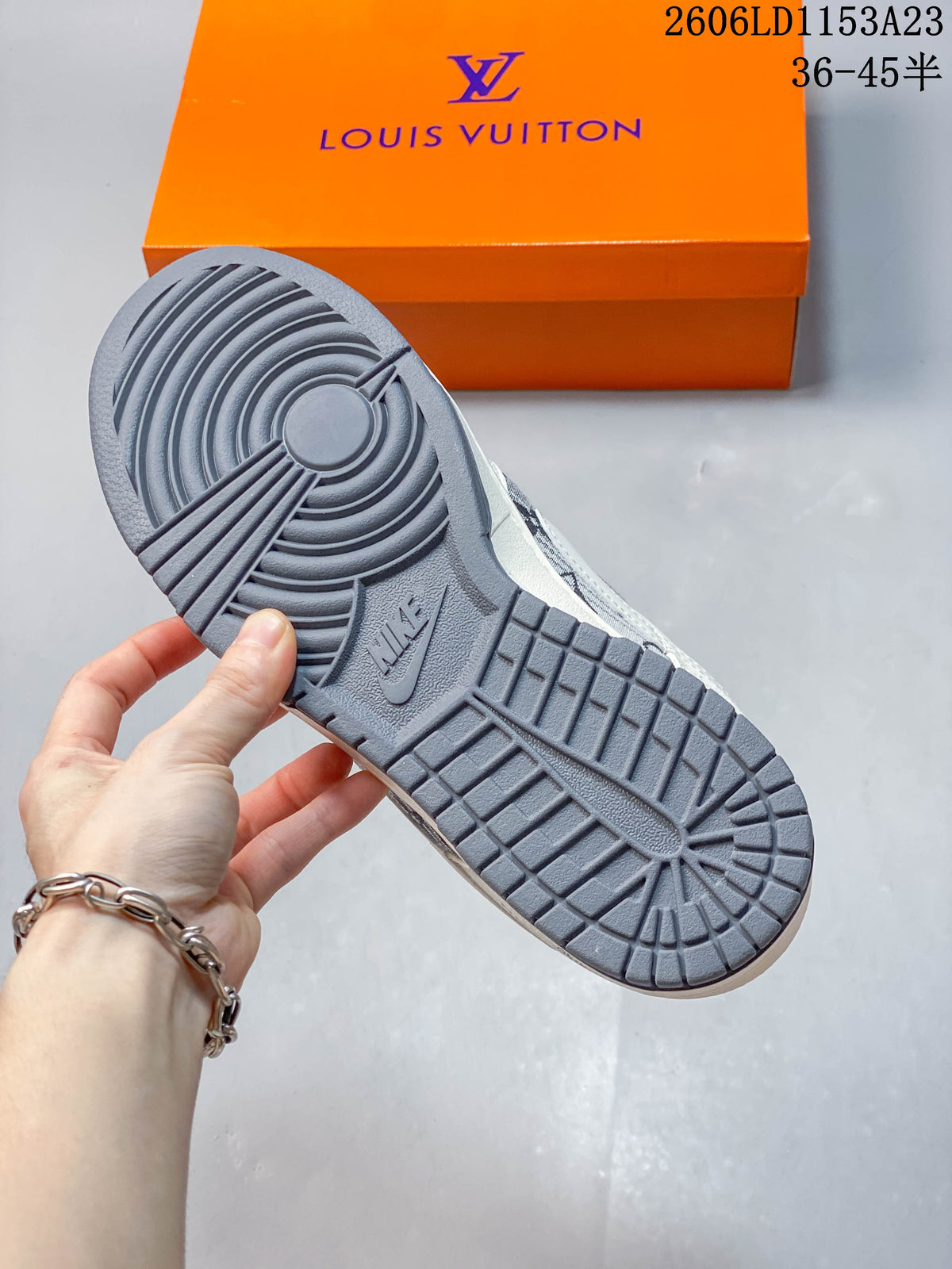 Close-up of the gray sneaker outsole and tread pattern
