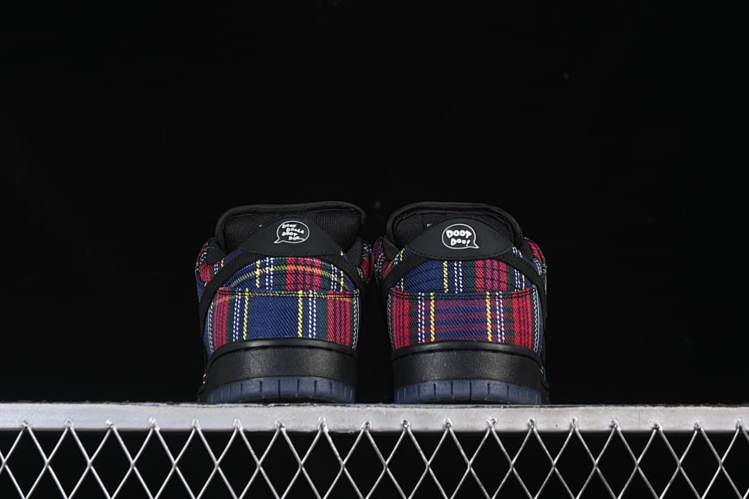 Rear view of both sneakers showing plaid heel panels and heel graphics.