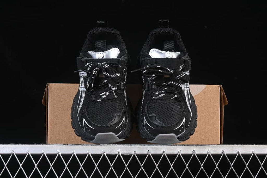 Front view of the pair, with laces and hook-and-loop straps visible.