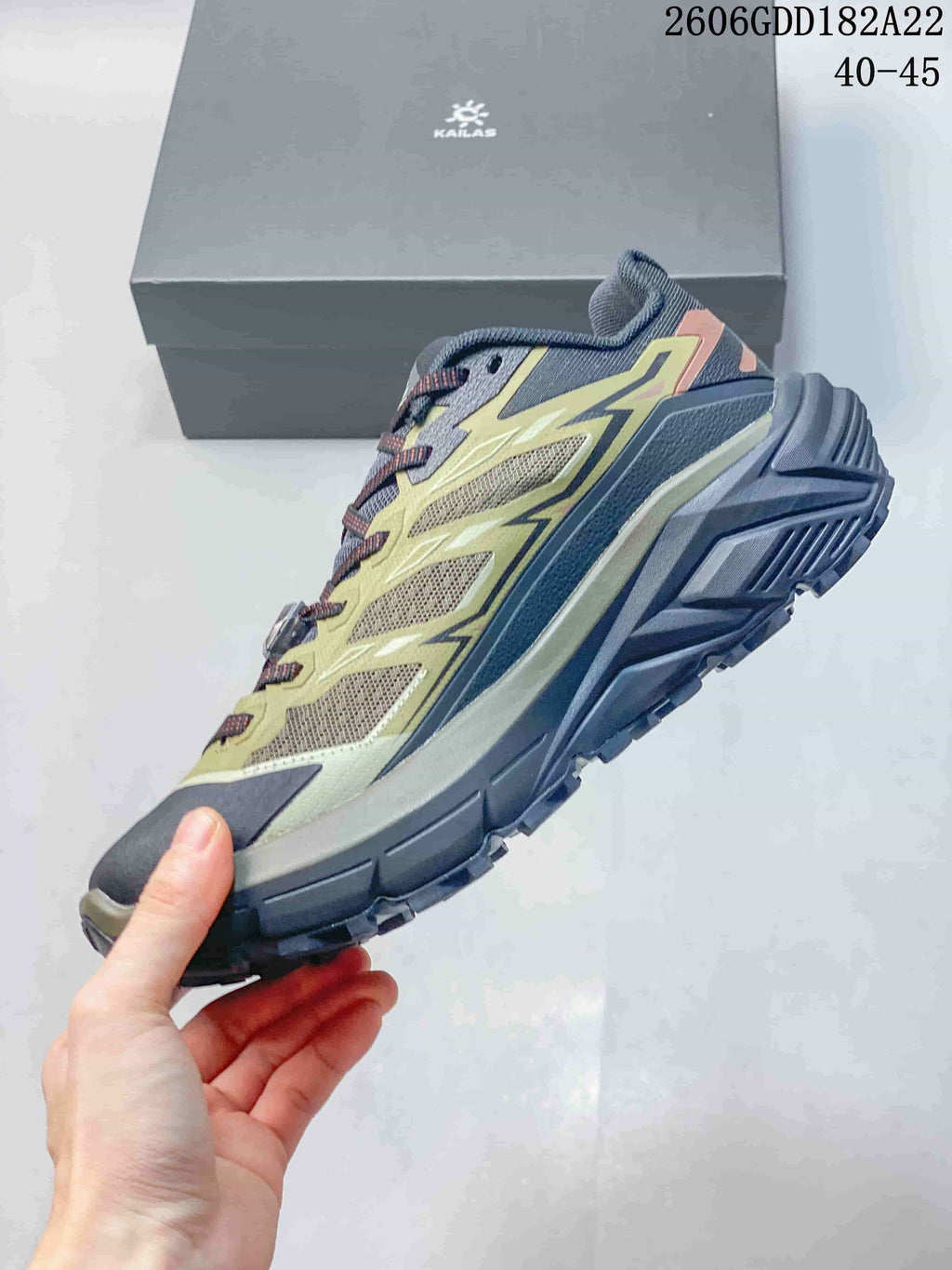 Side profile of the KAILAS C4 low-top trail shoe in yellow-green and dark gray