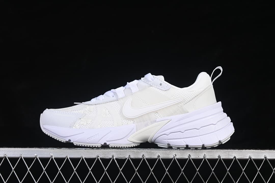 White Nike V2K Run sneaker shown from the side