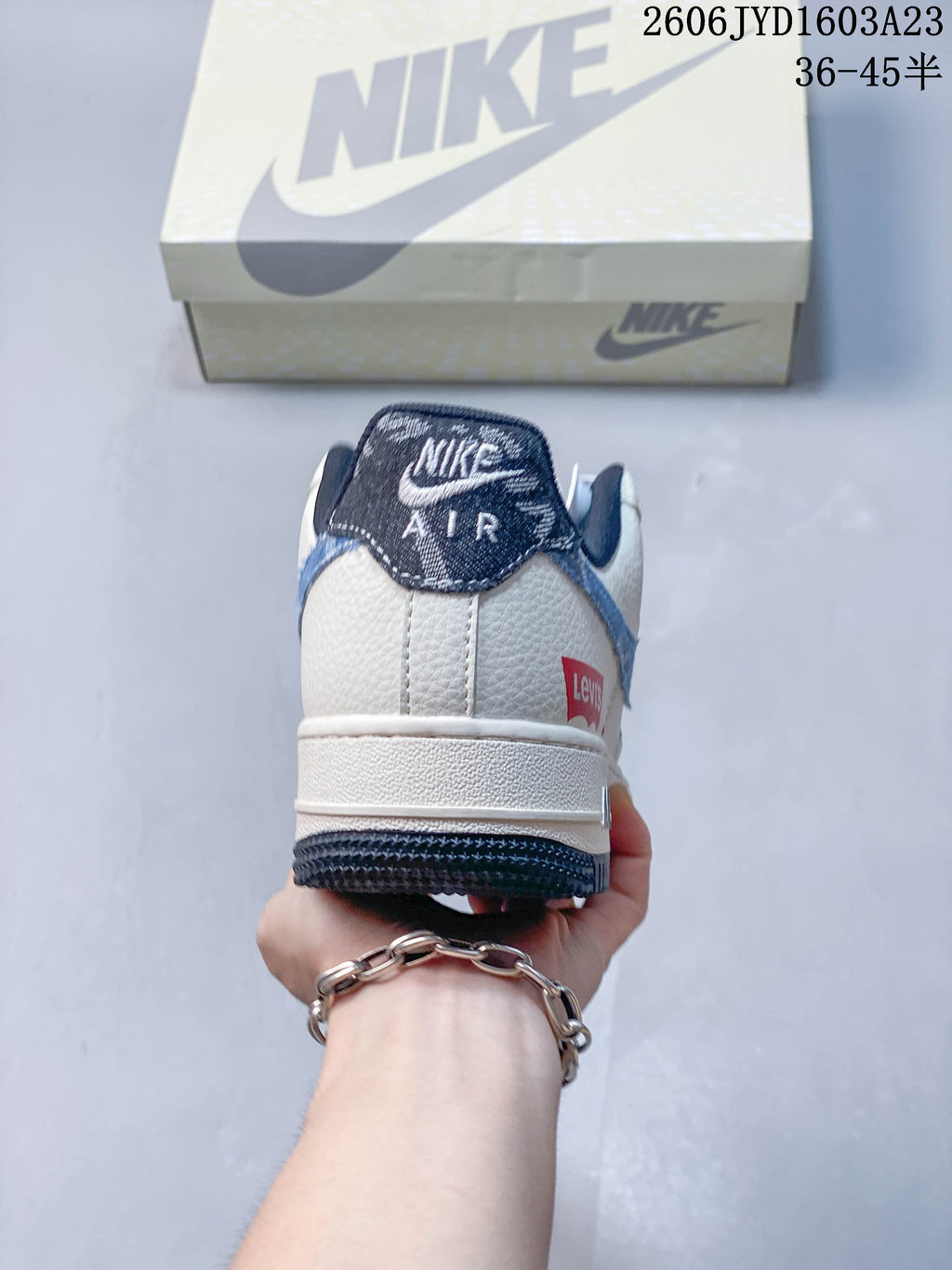 Rear view of the sneaker showing its heel panel and dark outsole