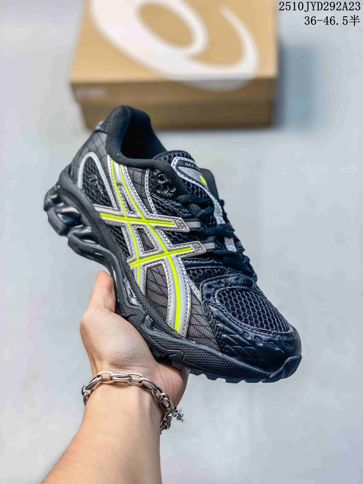 Black ASICS Gel-Nimbus sneaker with silver and neon yellow side accents.
