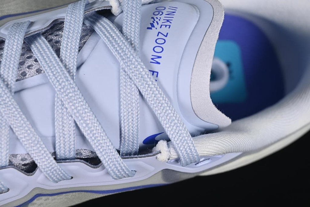 Close-up of the laces, tongue, and upper.