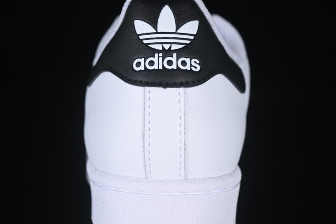 Rear view of the sneaker with a black heel tab and white branding