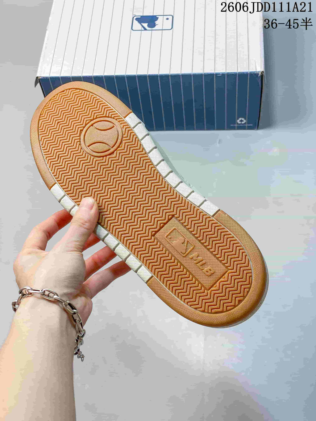 Gum-tone outsole with textured tread and MLB branding