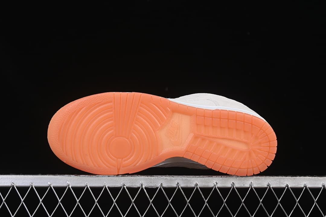 Gum-colored outsole with circular tread pattern