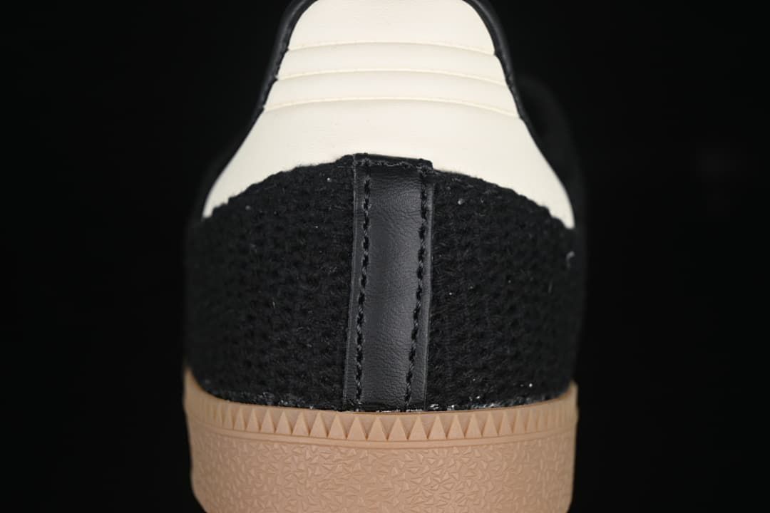 Rear view showing the white heel panel and gum-colored outsole