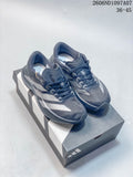 Pair of dark gray adidas Adizero Evo SL running shoes with silver-tone stripes, displayed on a shoebox.