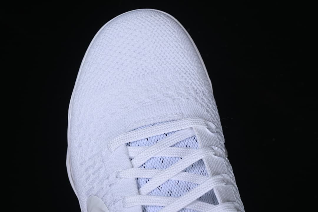 Top-down close-up of the textured toe and lace area