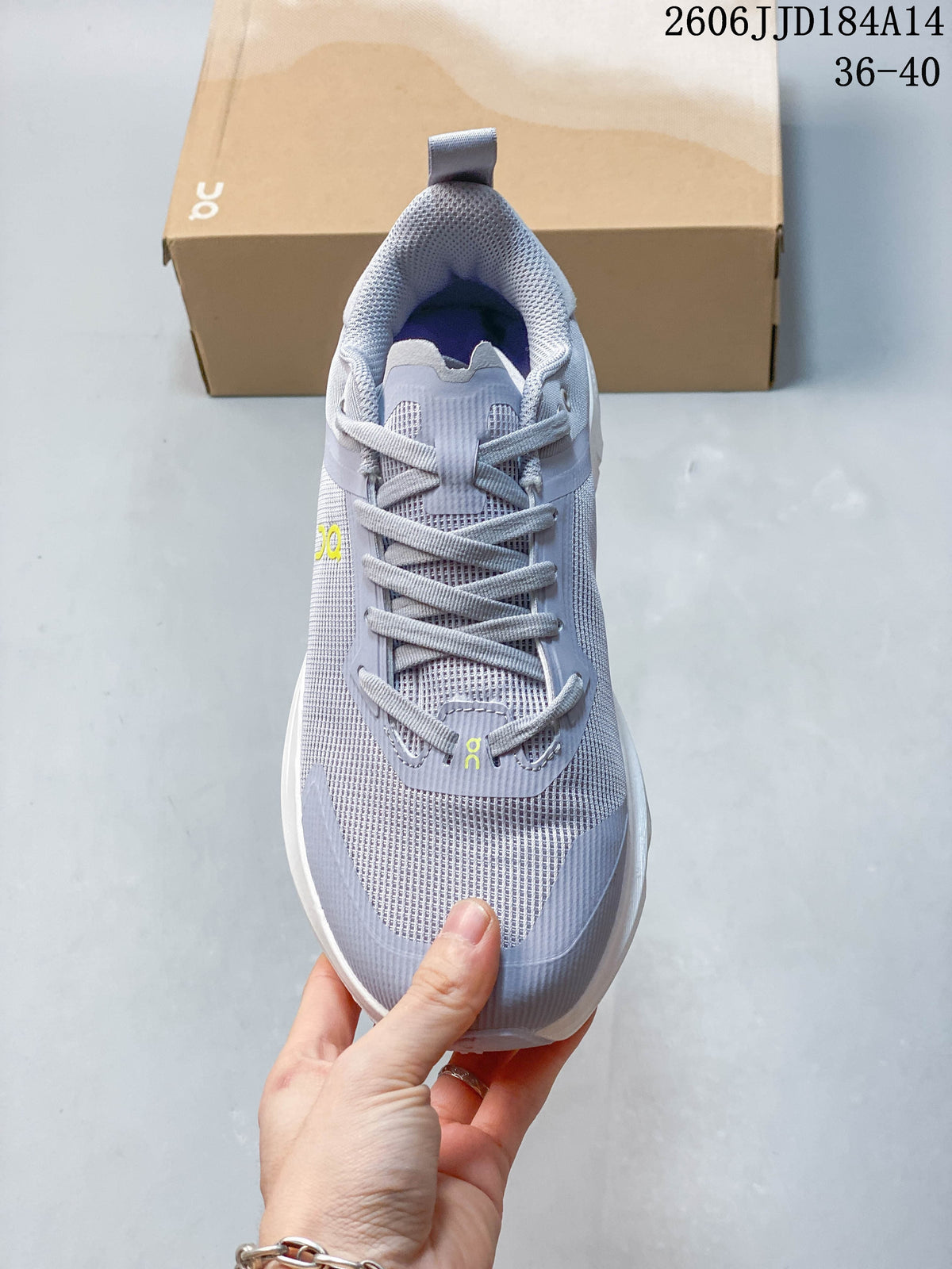 Top view of a grey lace-up On Cloudpulse Next running shoe.