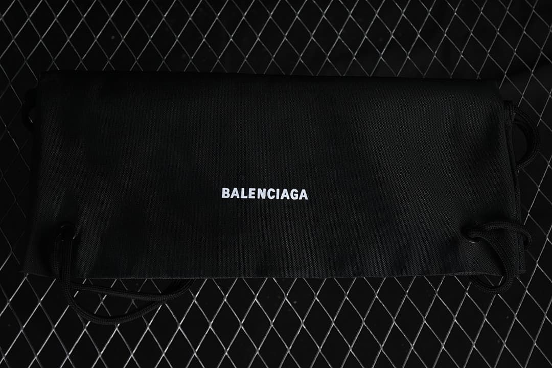 Black drawstring shoe bag with Balenciaga lettering