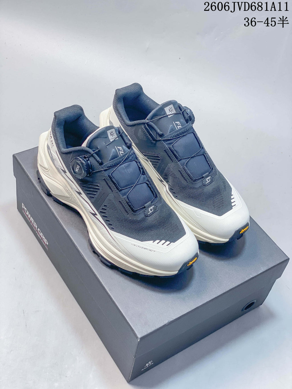 Blue and white KAILAS FUGA EX3 BOA shoes shown from above on a box.