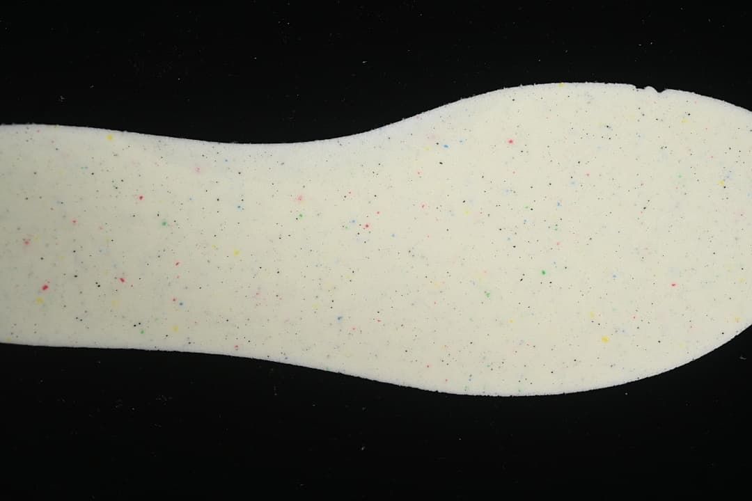 Close-up of the shoe insole with multicolor speckles