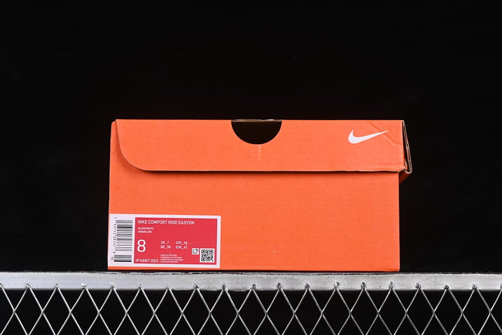 Orange shoe box with a label identifying Nike Comfort Ride Easyon, black and white, and style IF4997-002; the sample label shows EU 41.